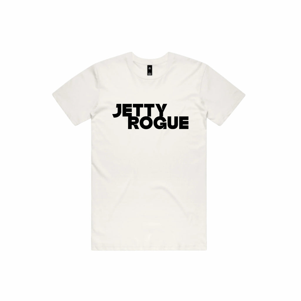 Bone tee flat lay: Jetty Rogue unisex tee in bone with black logo, flat lay